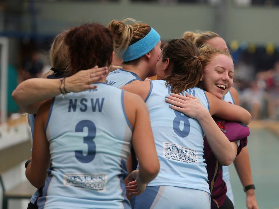 TIME TO CELEBRATE: The NSW women's team celebrates a goal in the Australian indoor final at Illawarra Hockey Centre on Sunday.