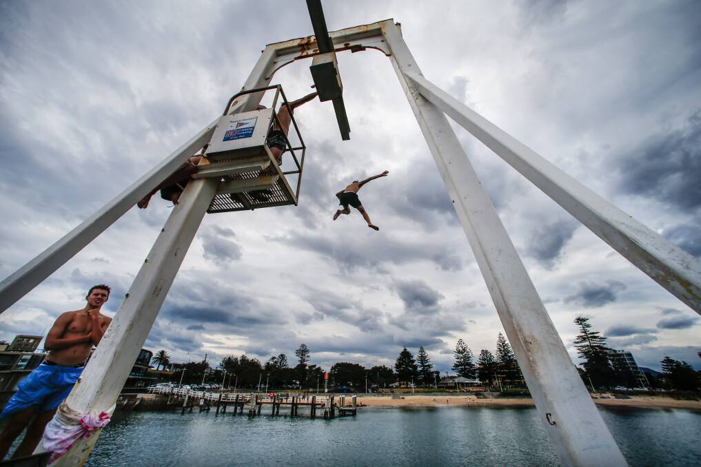 Teenagers cooling off at Wollongong Harbour. Photo: Adam McLean