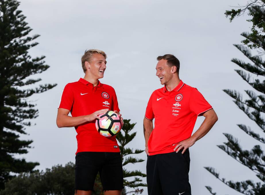 LEAD THE WAY: Lachlan Scott (left) and Brendon Santalab at North Wollongong Beach this week, before Saturday night's game in Brisbane. Picture: Adam McLean