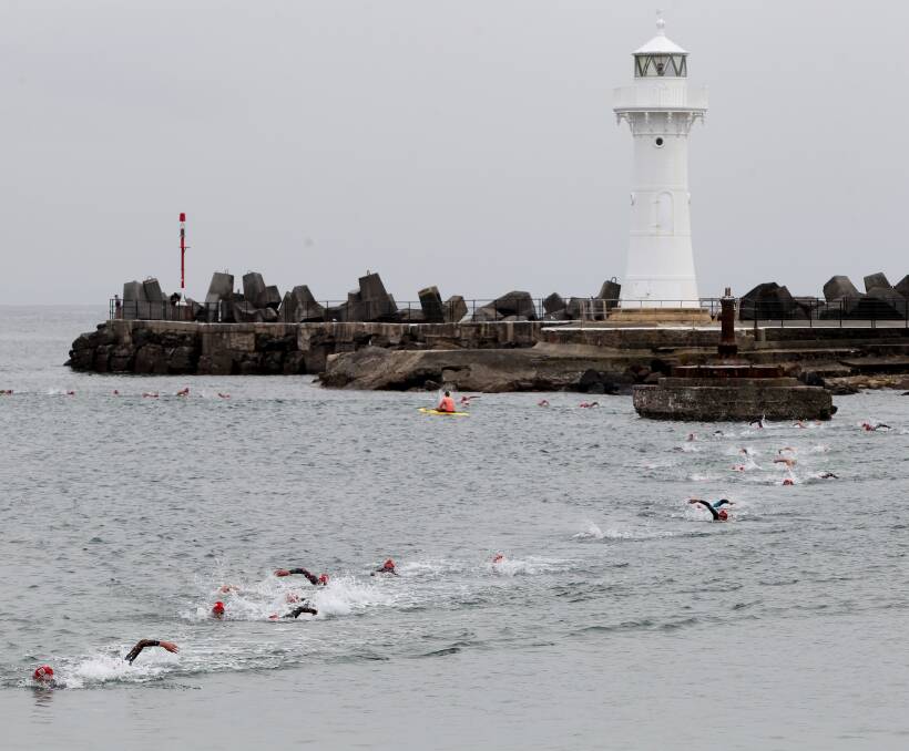 HARBOUR CHARGE: Entrants complete the course at Wollongong Harbour. 