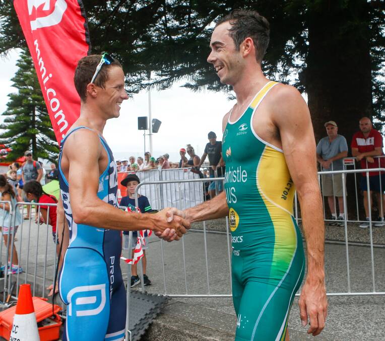 QUINELLA: Ryan Bailie shakes hands with training partner Jake Birtwhistle after the finish on Thursday. 