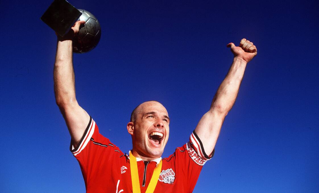 Glory days: Wolves Matthew Horsley celebrates with the NSL trophy in 2001. Picture: Adam Pretty/ALLSPORT