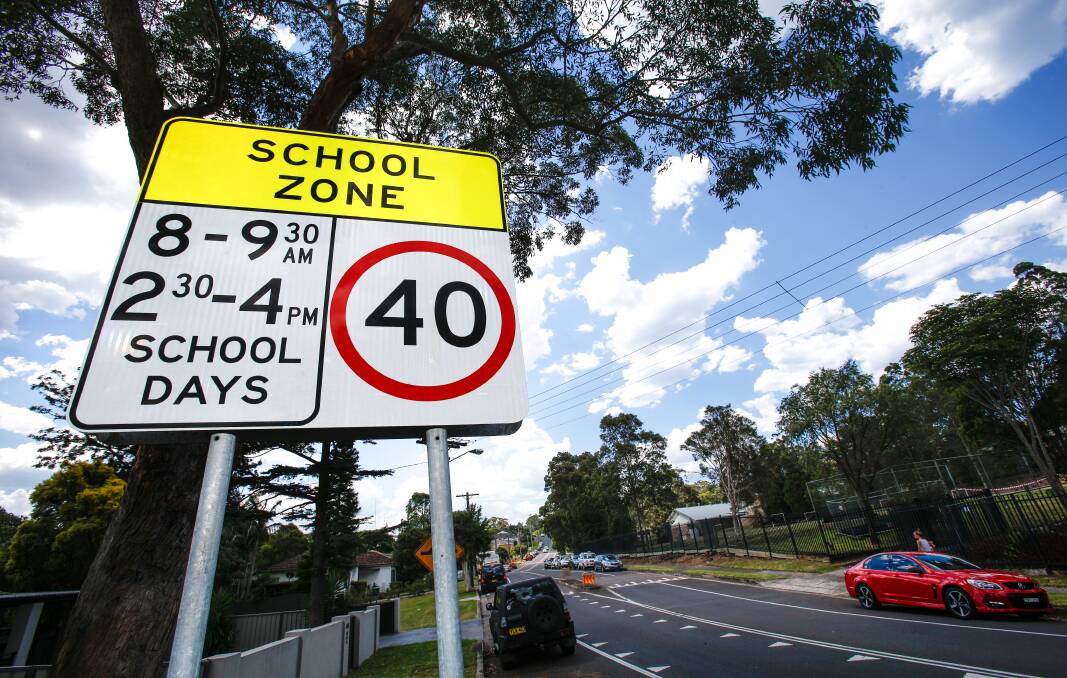 SAW THE SIGN: Those school road signs are just a suggestion, right?