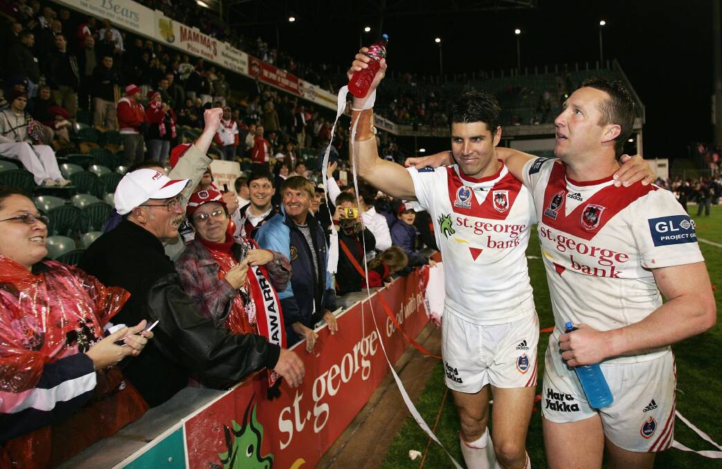 Hometown heroes: Trent Barrett and Shaun Timmins farewell fans after playing their last home game at WIN Stadium in 2006. Could we see more games in Wollongong again? Picture: Matt King/Getty Images