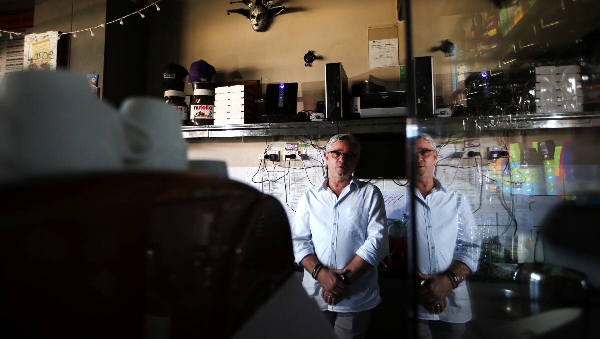 Figtree pizza shop owner Marc Ferri said he had a "traumatic" time getting the NBN connected at his business, waiting 10 weeks for work to be completed. Picture: Sylvia Liber