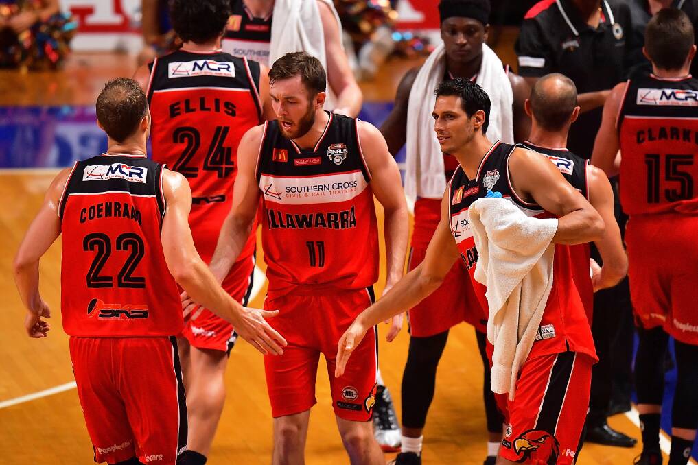 TEAM EFFORT: The Illawarra Hawks will need to be at their best to overturn a two game deficit against the Perth Wildcats. Picture: GETTY IMAGES