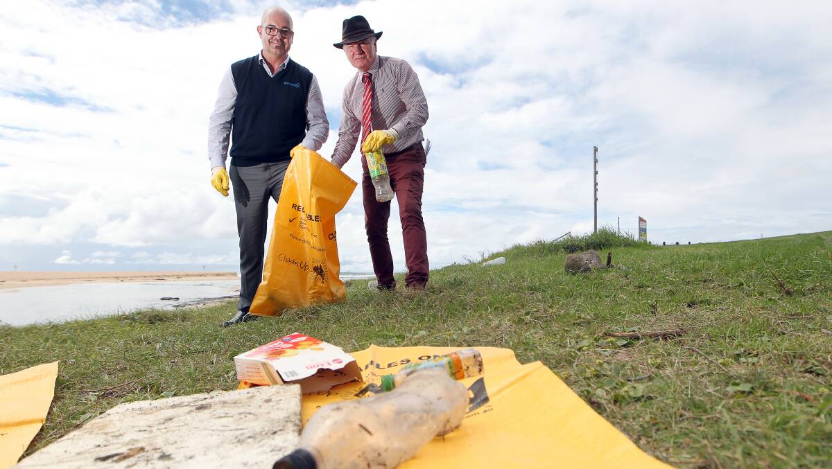 DON'T BE A TOSSER: David Cooper from Cleanaway and Wollongong Lord mayor Gordon Bradbery spread the word about Clean Up Australia Day. There are 20 events across the city this weekend. Picture: SYLVIA LIBER