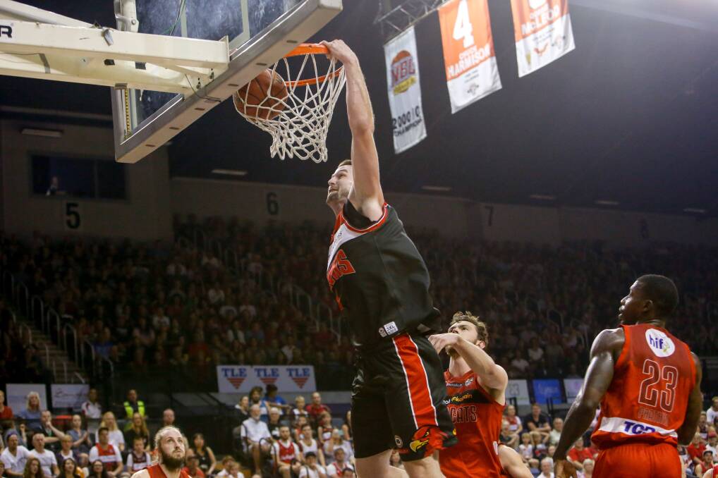 Yes man: Marriage equality supporter AJ Ogilvy dunks for the Illawarra Hawks last season. Picture: Adam McLean