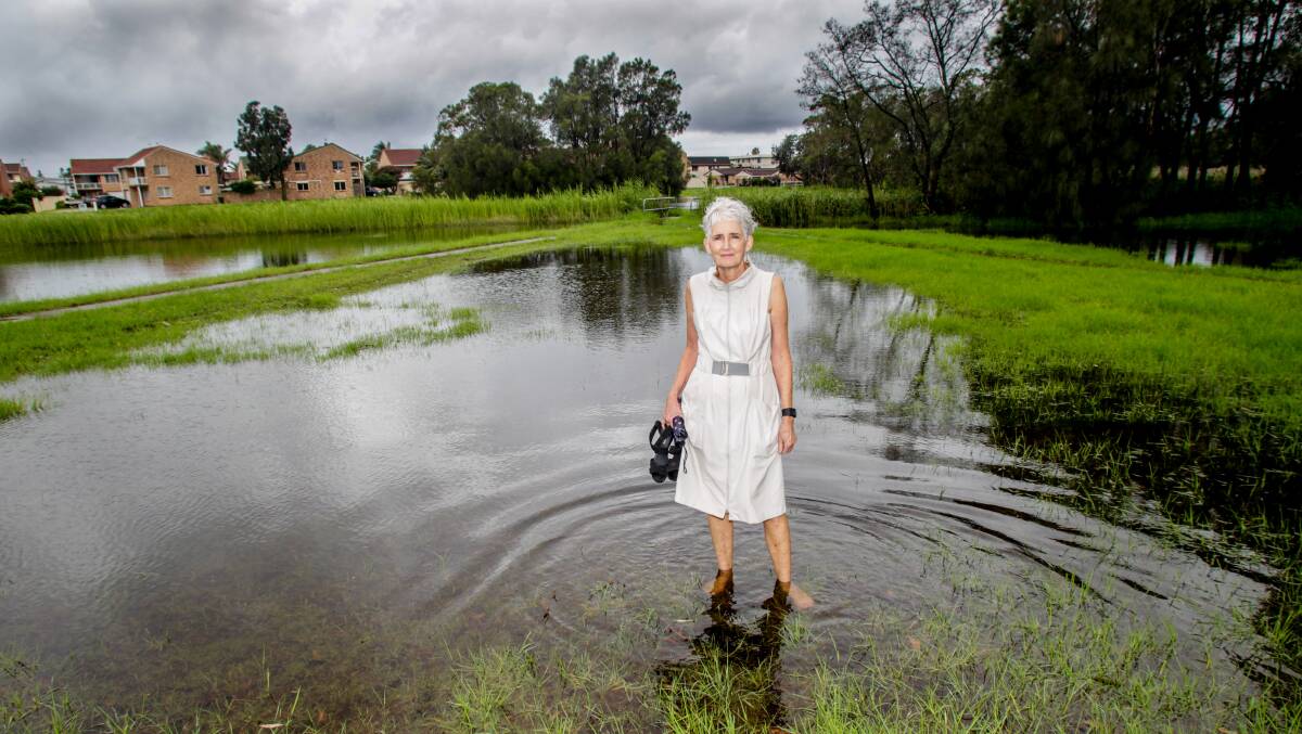 Damp spot: Warilla resident Diane Quinlin at the proposed site of the new Warilla Library, which was flooded on Friday. Picture: Georgia Matts.