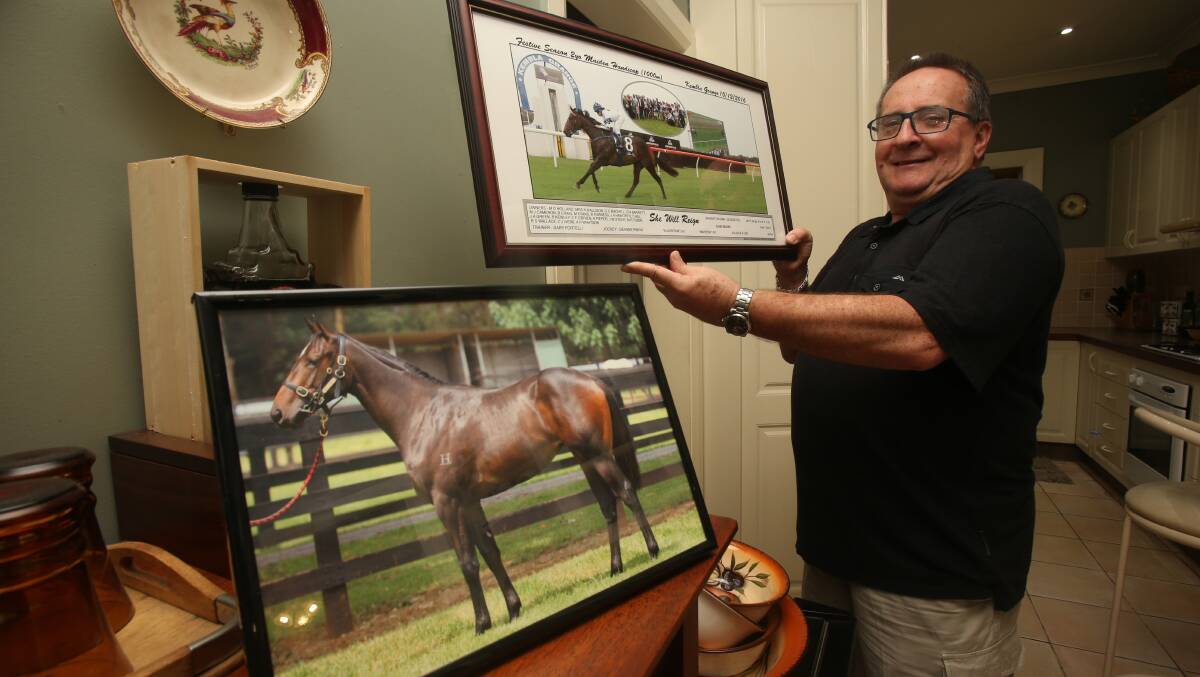 Michael Tobin with pictures of She Will Reign. Picture: Robert Peet