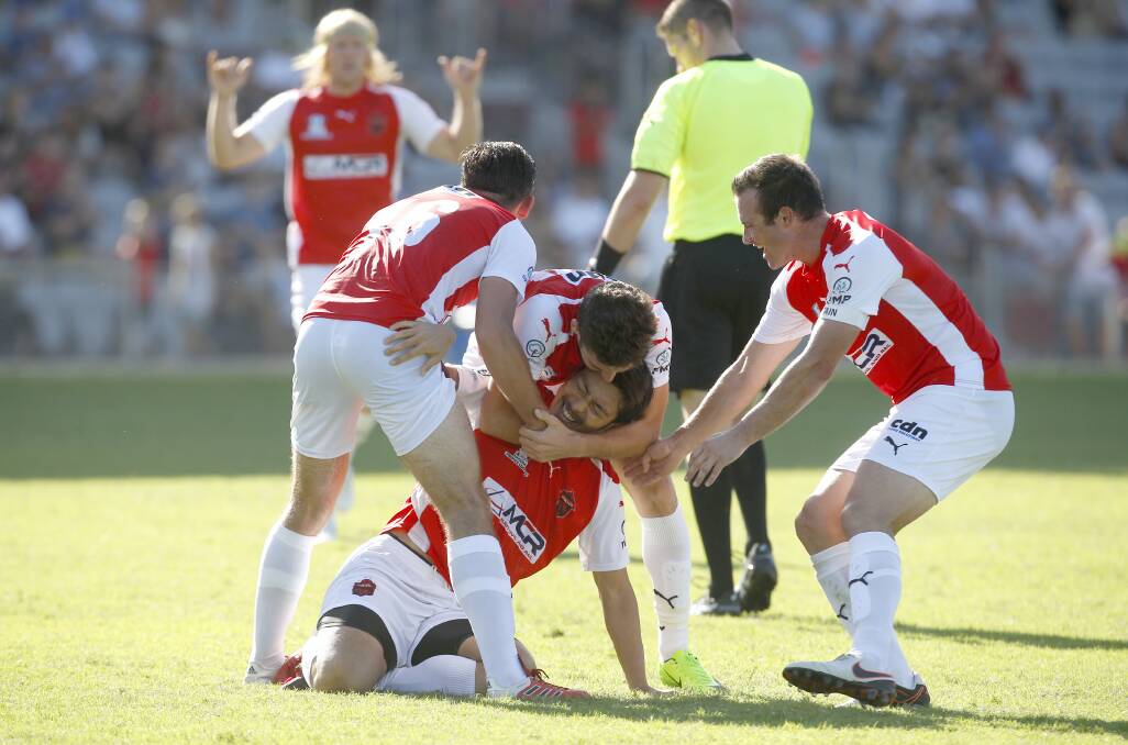 Ultimate goal: The Wollongong Wolves celebrate scoring at WIN Stadium. Picture: Adam McLean 