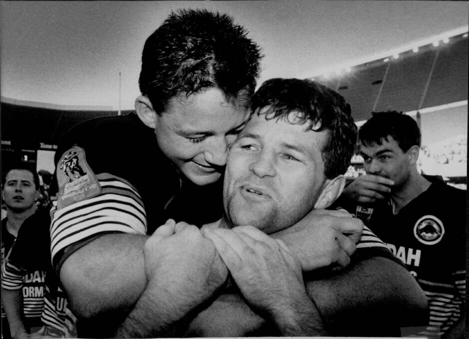 LEGEND: Panthers great Royce Simmons, pictured with Mark Geyer after the 1991 grand final, will be a guest at the Illawarra Men of League luncheon. Picture: Craig Golding