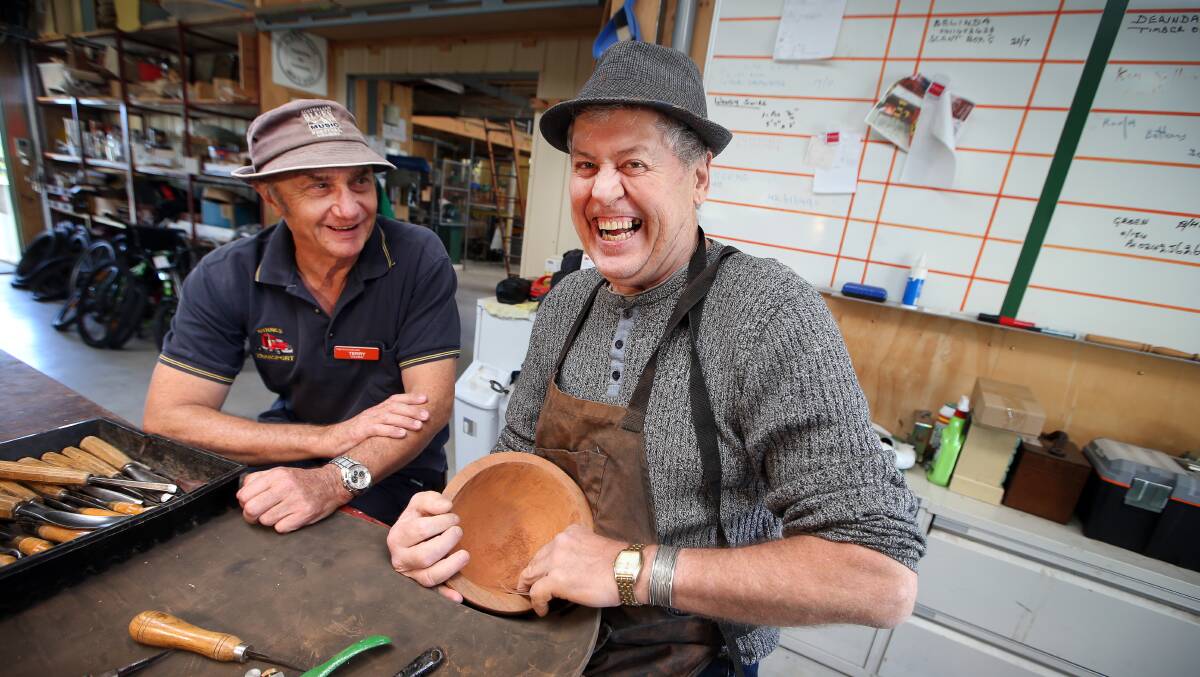 Mateship: HammondCare volunteer Terry Smith and resident Peter Hayes, who has young onset dementia, enjoy their weekly visits to Albion Park's Men's Shed where Mr Hayes can enjoy his craft. Picture: Sylvia Liber