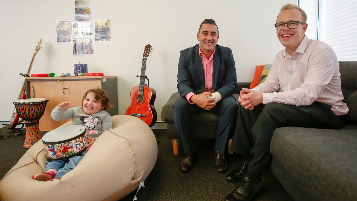 Fresh start: Northcott customer Charlotte Campbell, 3, with area manager Mark Borg and support worker Cameron Ryan at the new Wollongong office. Picture: Adam McLean