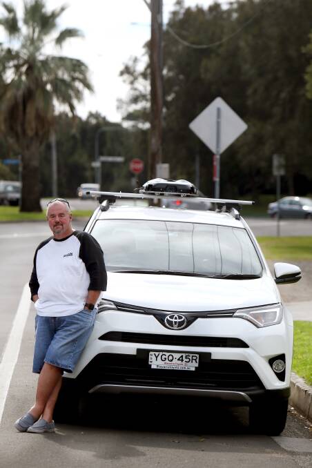 Steve Johnson is driving one of the Uber mapping cars - with a roof-mounted camera -
 around the region, taking photos of the streets to improve the maps on its app. Picture: Sylvia Liber