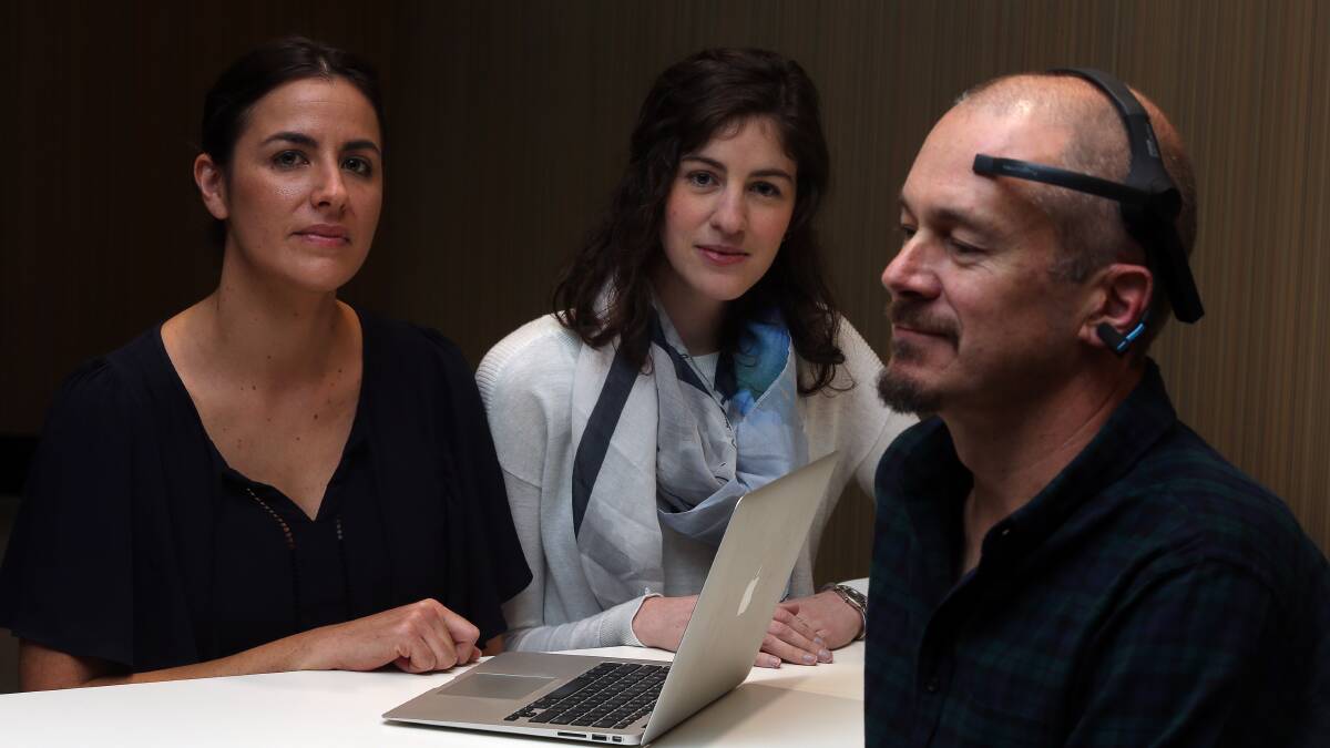 CUTTING EDGE APP: Breanna Shuttlewood, Jessica Buster and Stuart Johnstone from UOW's School of Psychology. Picture: Robert Peet