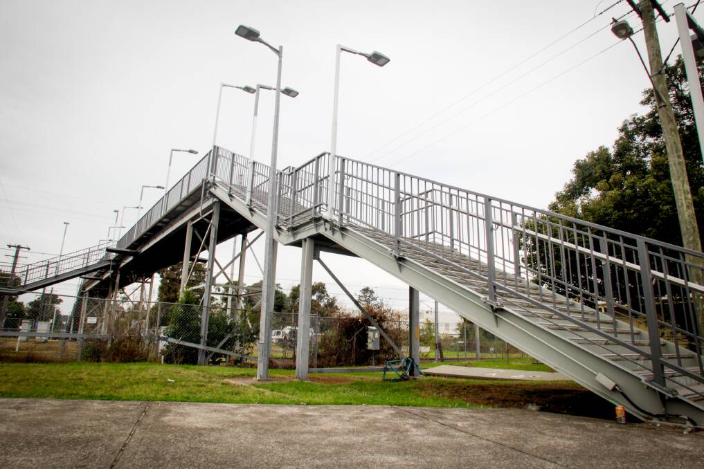 The Unanderra station stairs look like they'll be there for another year after not being on the list of upgrades announced by NSW Premier Gladys Berejiklian. Picture: Georgia Matts