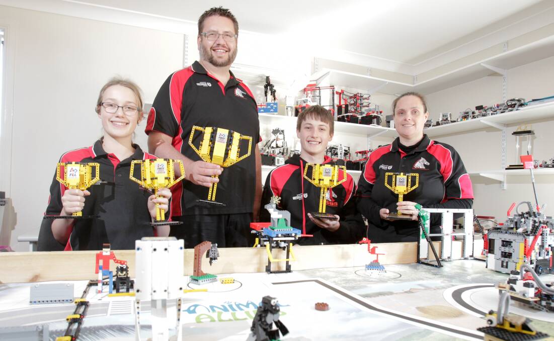 HOME SCHOOL FAMILY: ​Faith Clark, Andrew Clark, Isaac Clark and Lyndell Clark are part of the Project Bucephalus team which finished third in a major international robotics event. Picture: Adam McLean
