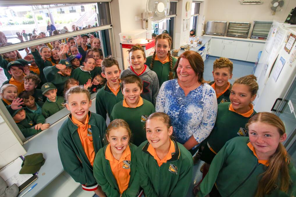 HANGS UP APRON: Helensburgh Public School's retiring canteen manager Bronwyn Charman with some of her canteen helpers. Mrs Charman ended her 17-year association with the school on Friday. Picture: Adam McLean