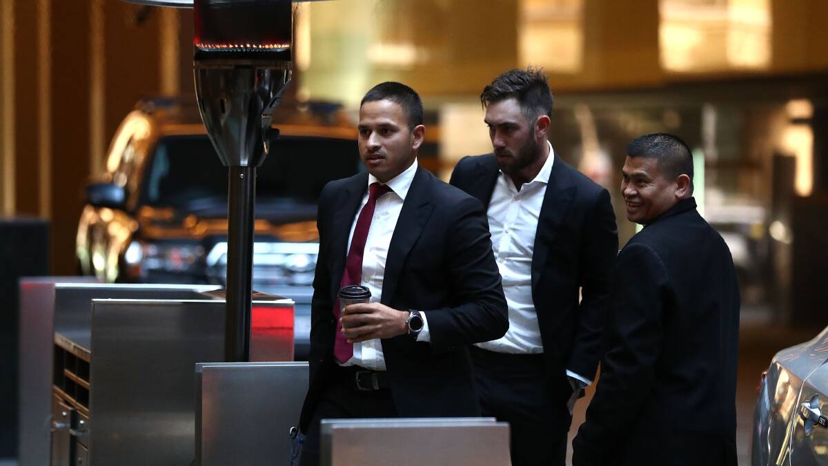 Crisis meeting:  Australian cricketers Usman Khawaja and Glenn Maxwell arrive for the ACA emergency executive meeting at the Hilton Hotel on Sunday. Picture: Ryan Pierse/Getty Images
