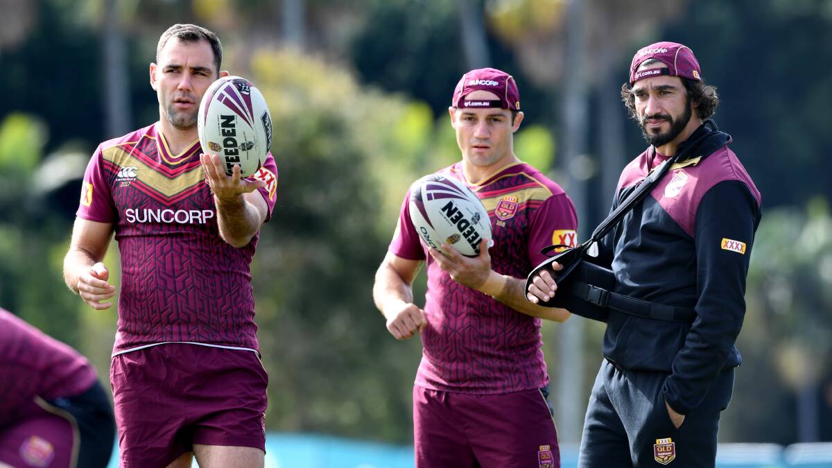 Brains trust: Cameron Smith, Cooper Cronk and Johnathan Thurston. Picture: AAP Image/Dave Hunt