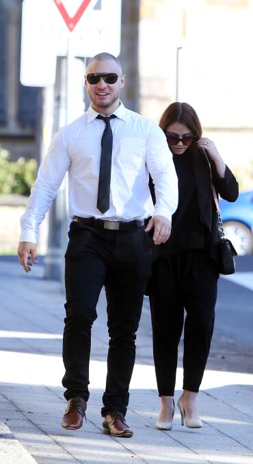 Charged: Jake Sara and girlfriend, Kayla Todd, attend Wollongong courthouse on Tuesday. Todd peladed guilty to four assault-related charges.