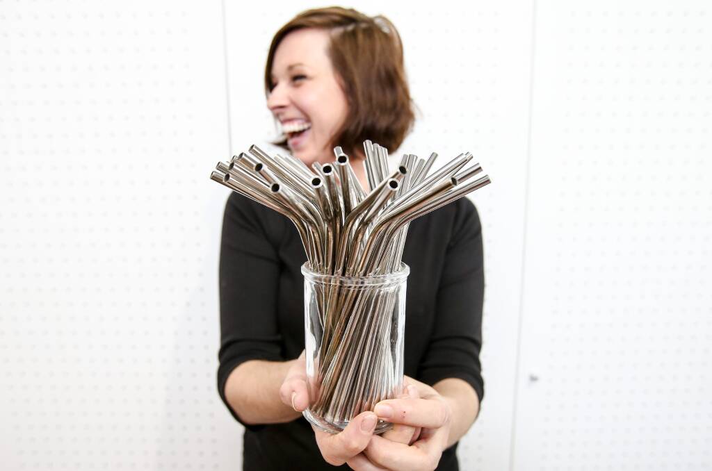 No time to waste: Prue Krishnayya, co-owner of Lower East cafe in Wollongong, with a collection of the cafe's reusable metal straws. Picture: Adam McLean.