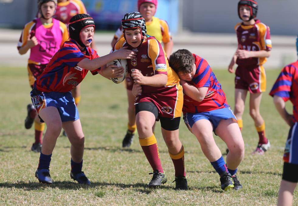 Tackle: Shellharbour's Jai McLennan.against Wests in the grand final at Dapto Showground.