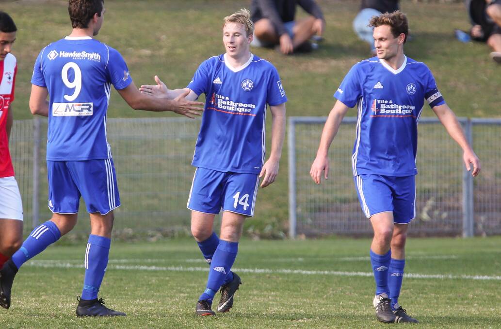 HAT-TRICK: Bulli's Dylan Lewis (centre) played a starring role in his team's comfortable win over Port Kembla. Picture: ADAM McLEAN