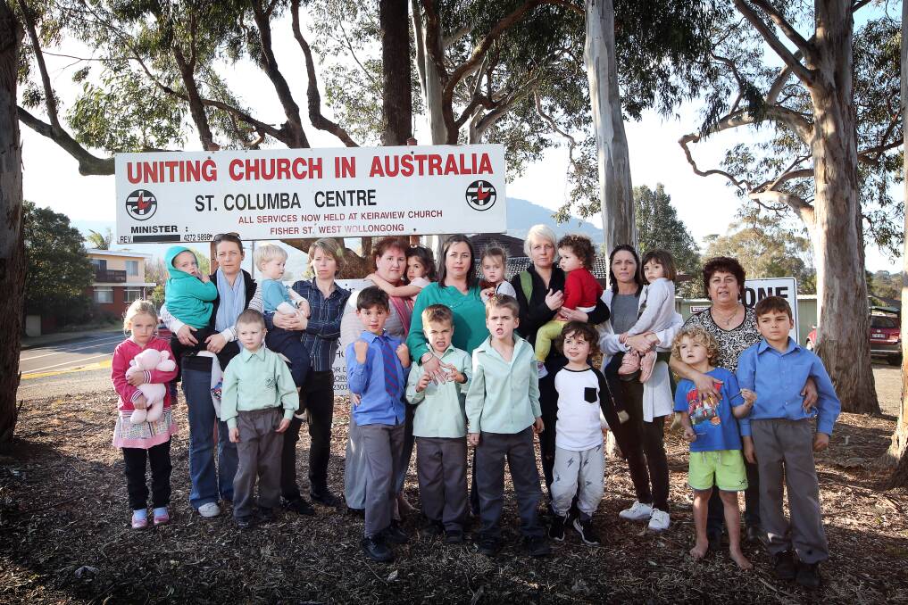 SAVE OUR PRESCHOOL: Angry parents are not happy land housing St Columba Uniting Church Preschool is being sold by the Keiraview Uniting Church. Picture: Sylvia Liber.