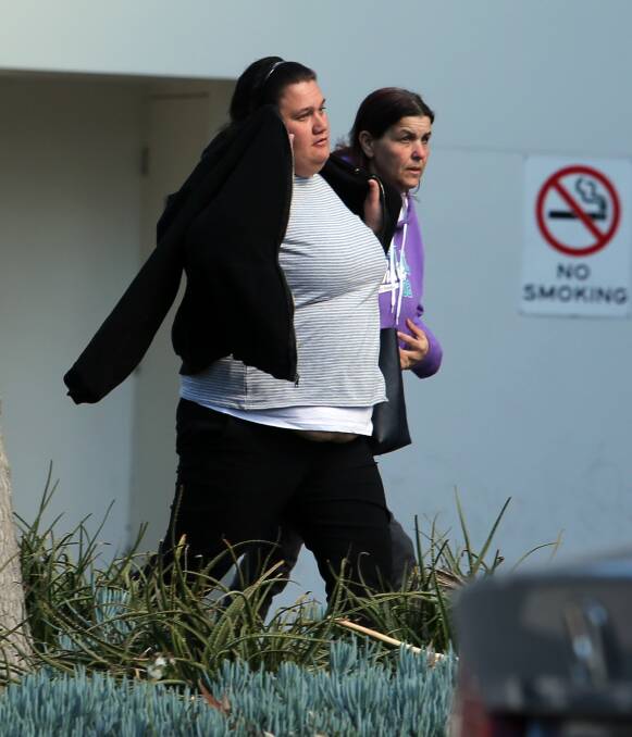 Work it: Belinda Kemp (left) leaves Wollongong courthouse on Friday accomapnied by a friend after being handed a community service order. 