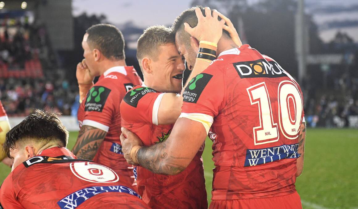 Man on a mission: Matt Dufty (left) celebrates during this year's NRL campaign. Picture:  NRL Imagery 