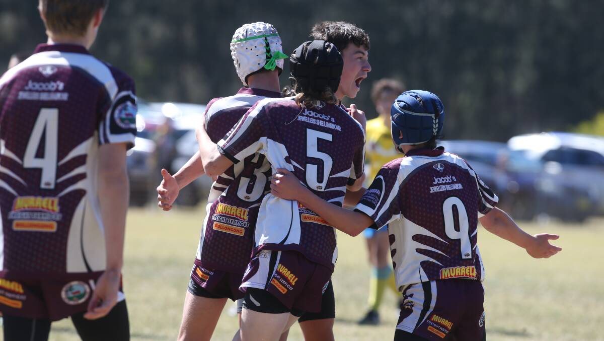 We're in: Albion Park-Oak Flats under 14 division two players celebrate.