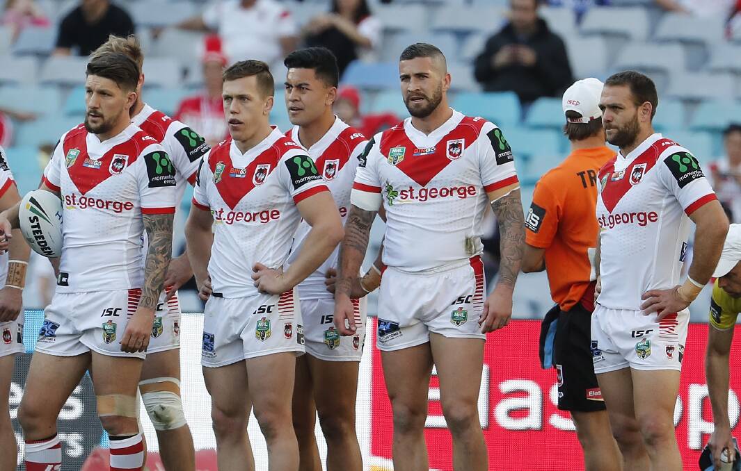 Down and out: Deject St George Illawarra players. Picture: AAP Image/Daniel Munoz