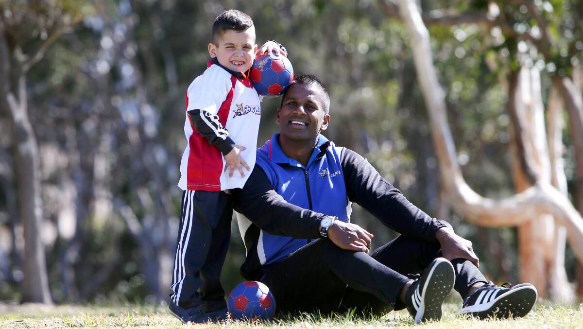 ON THE BALL:  Soccajoeys South Coast owner Stephen Krishna with Abdallah Abu Qasim  ahead of the soccer open day supporting SCARF. Picture: Sylvia Liber