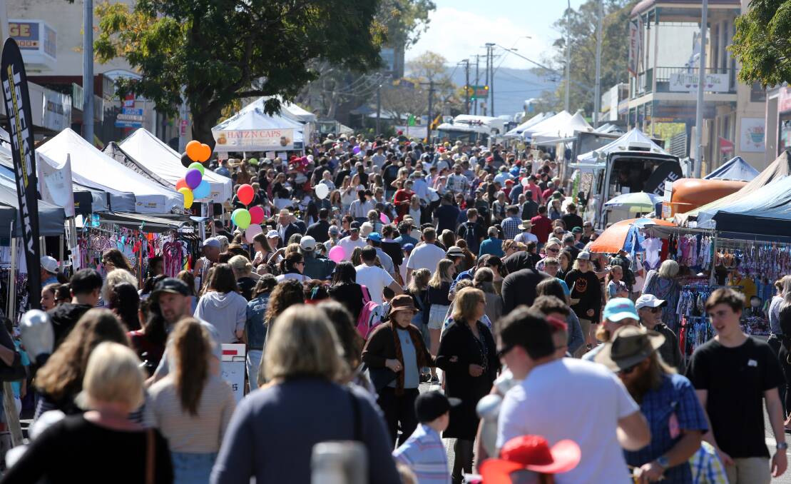 More than 55,000 people were estimated to visit the 2017 Spring Into Corrimal community festival, which runs along the Princes Highway. Picture: Robert Peet