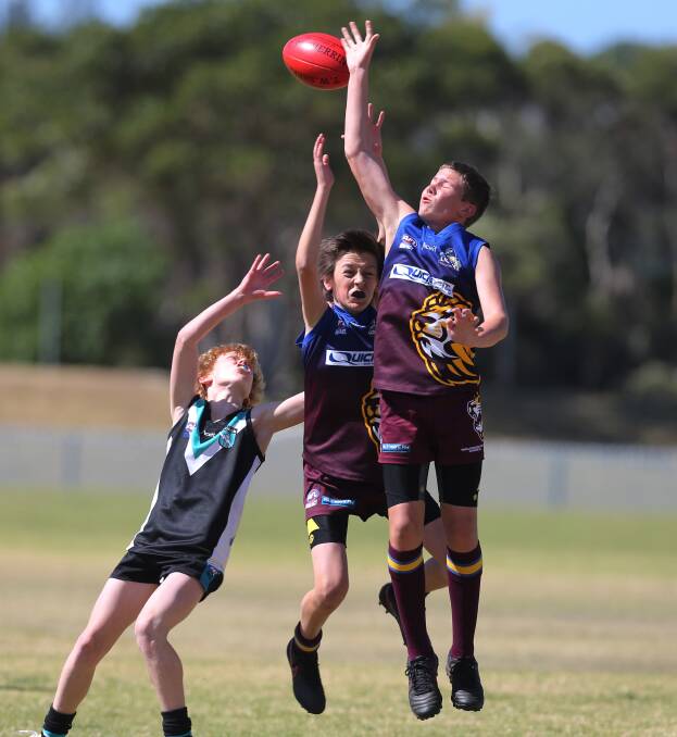Contest: It was a busy weekend of junior AFL. Picture: Robert Peet.
