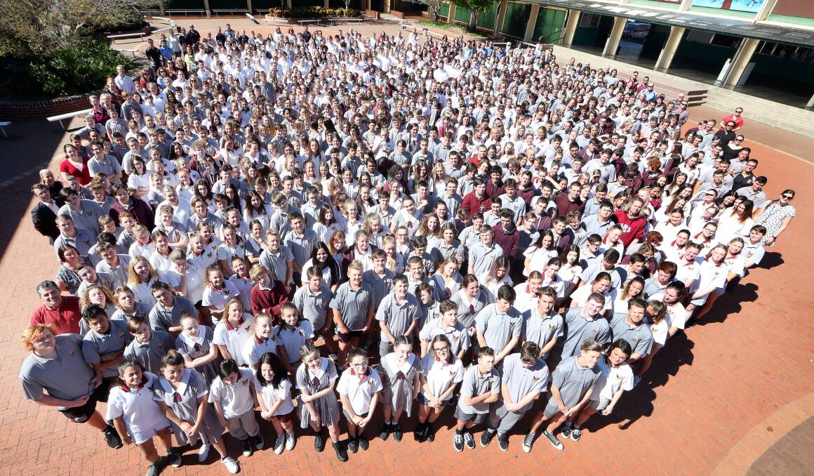 GROUP PHOTO: Dapto High School 's 1000 students gathered together to get a photo taken to mark the school's 60th anniversary celebrations. An anniversary dinner will be held on November 11. Picture: Sylvia Liber