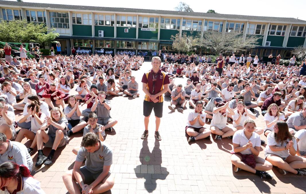 DESERVED APPLAUSE: Dapto High School students show their appreciation to  teacher Joel Trist, who received the Star of Courage bravery award. Picture: Sylvia Liber