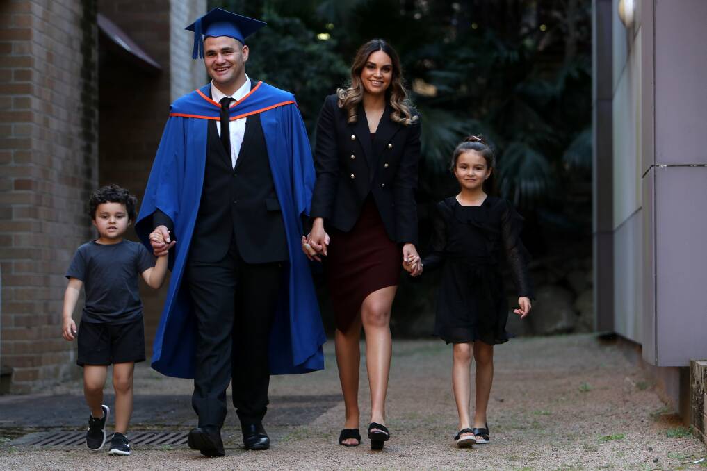 TOP OF THE CLASS. Russell Packer with wife Lara, son Marley and daughter Maddie at University of Wollongong. Picture: Sylvia Liber