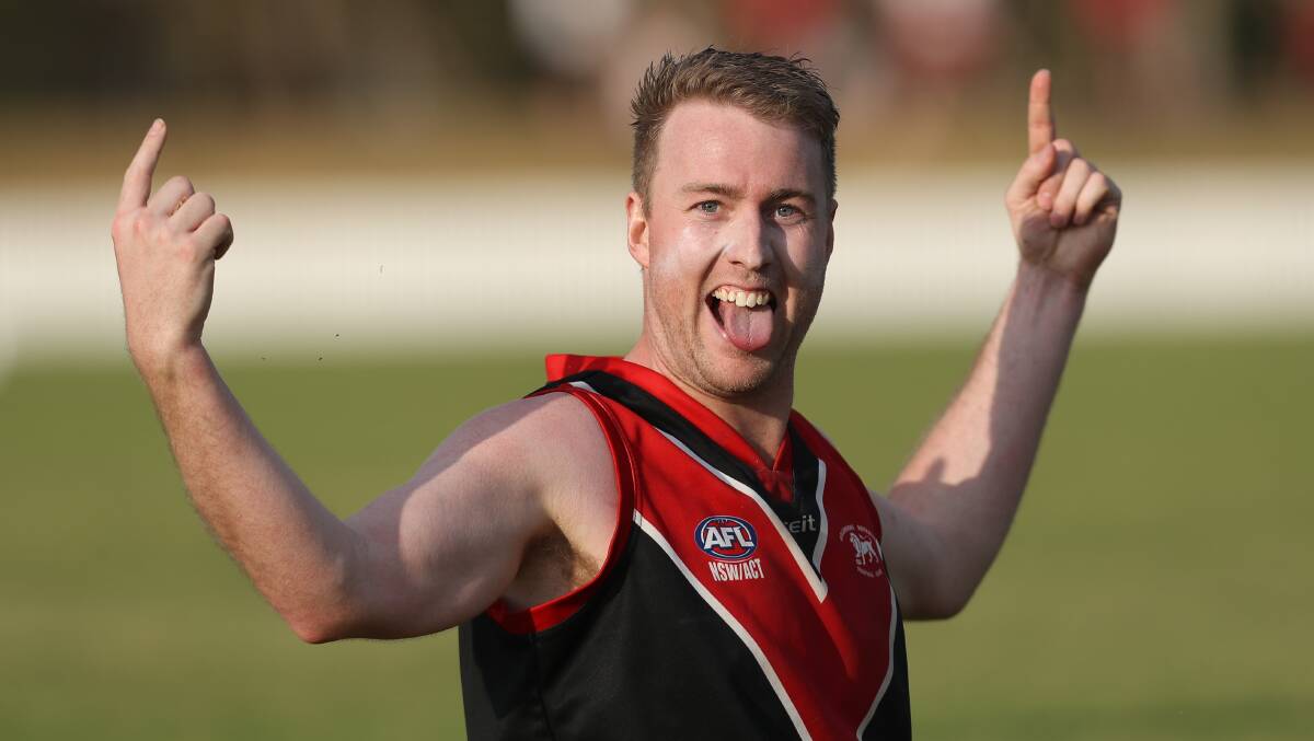 Back-to-back: Alex Cotter celebrates a goal to win the grand final. Picture: Adam McLean