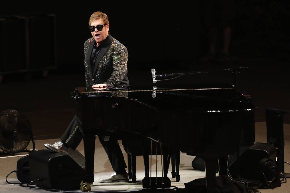 NOBODY MET ELTON: Elton John has his own security PLUS a van to drive him 50 metres from his private helicopter to his change room, then back again within minutes of his Wollongong show ending. Picture: Adam McLean