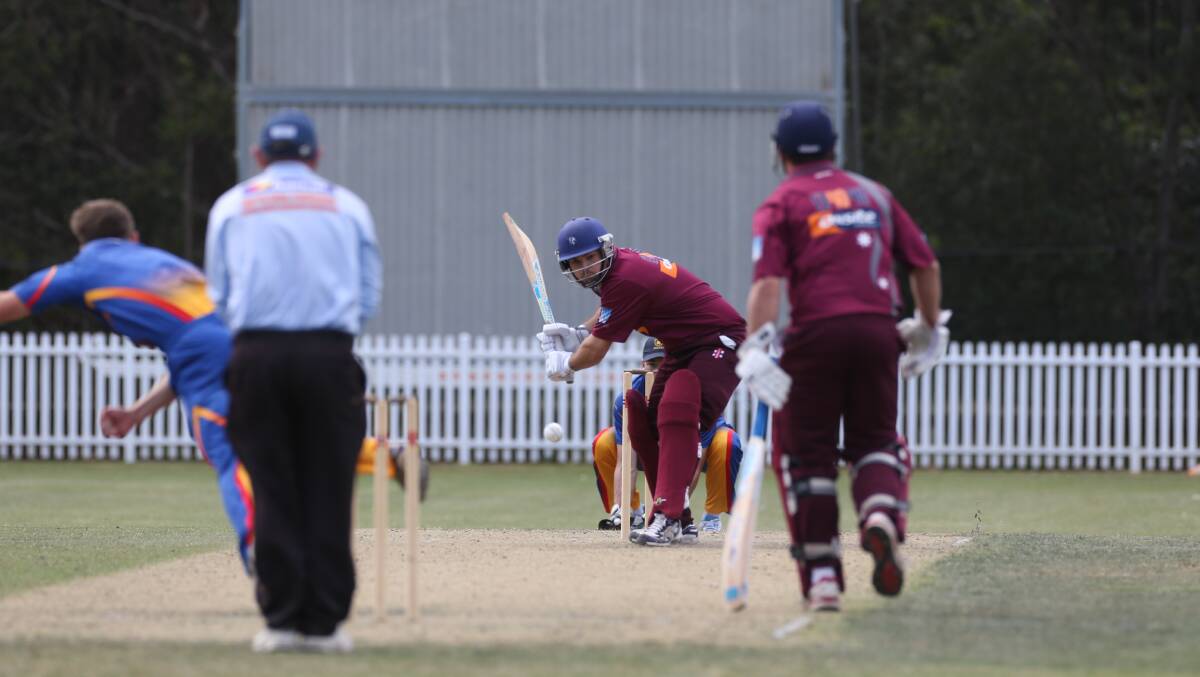 Watching it on: Wollongong Batsmen Kieran Grey gets on the front foot against University on Saturday.