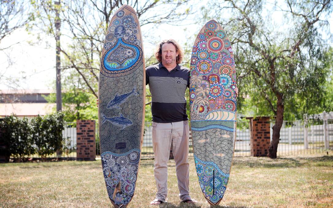 Gareth Smith of GWS Surfboards is exhibiting at the inaugural Illawarra Festival of Wood this weekend at Bulli Showgrounds. He often recycled pallets into boards - making shortboards, old style single fin boards and mals. Picture: Sylvia Liber