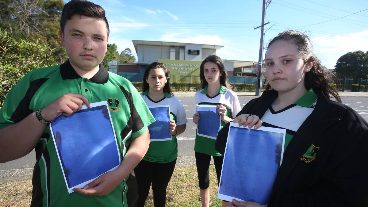NOT HAPPY: Wollongong High School of the Performing Arts students Leon Lippe, Amy Karlou, Alexandra Pieper and Sophie Hooper handed in a 605-strong petition to save the job of their student support officer. Picture: Robert Peet