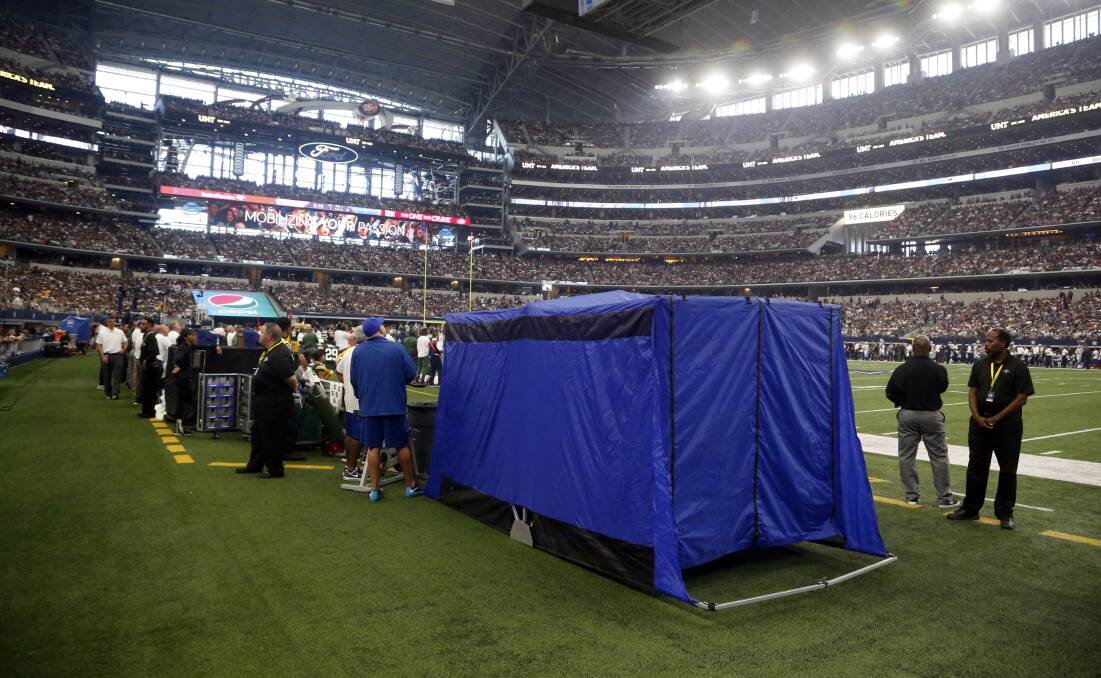 HORSES FOR COURSES: Medical tents on NFL sidelines, eerily reminiscent of the screens that are set up around injured racehorses.