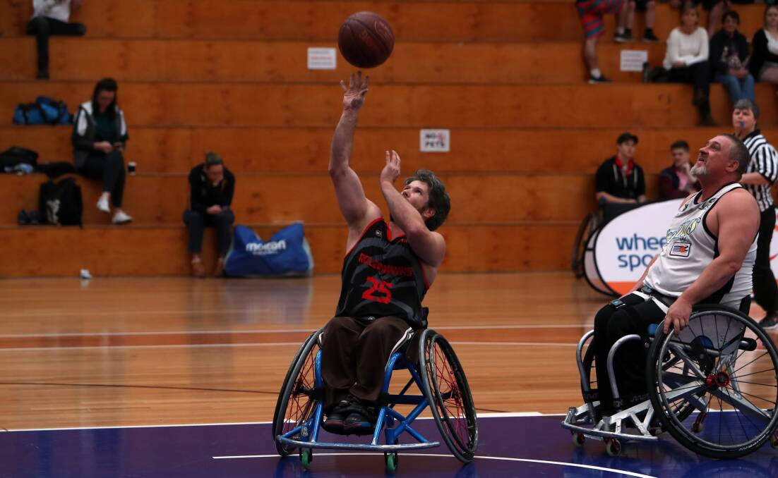 Aiming up: Wollongong Roller Hawks' Ashley Kennedy shoots.