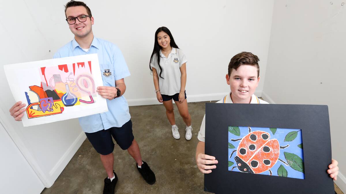STUDENT ART: ​Warilla High School students Daniel Hall, Leanne Vo and Zachary Nicholls will exhibit works at Red Point Gallery in Port Kembla. Picture: Adam McLean