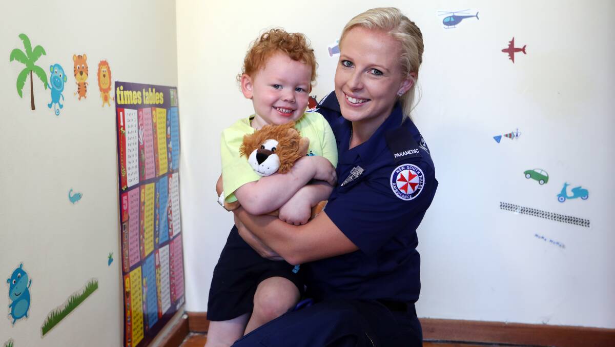 Saying thanks: Little Leo got to meet one of his rescuers on Monday morning, paramedic Kahlie McLennan. Picture: Sylvia Liber