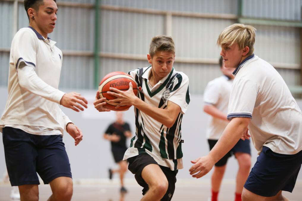 School challenge: Keira took on Oak Flats in the senior boys basketball as part of the Sims Wright Challenge Shield. Picture: Georgia Matts.